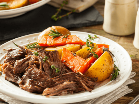 I love that this easy crockpot / slow cooker pot roast is so melty in my mouth! My love of beef pot roast goes back to my grandma - and this recipe is the best with red wine and just the perfect seasoning! The slow cooker saves the day! #slowcooker #potroast www.themidlilfemamas.com