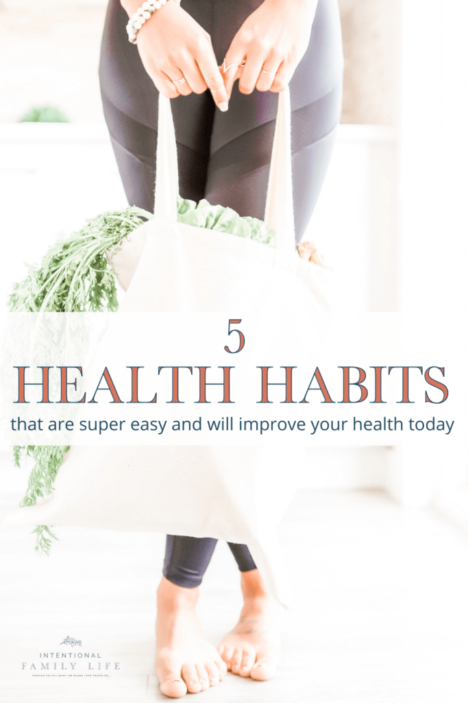 an image of a woman in black yoga pants from the waist down holding a cotton grocery bag with produce overflowing suggesting the idea of healthy lifestyle habits