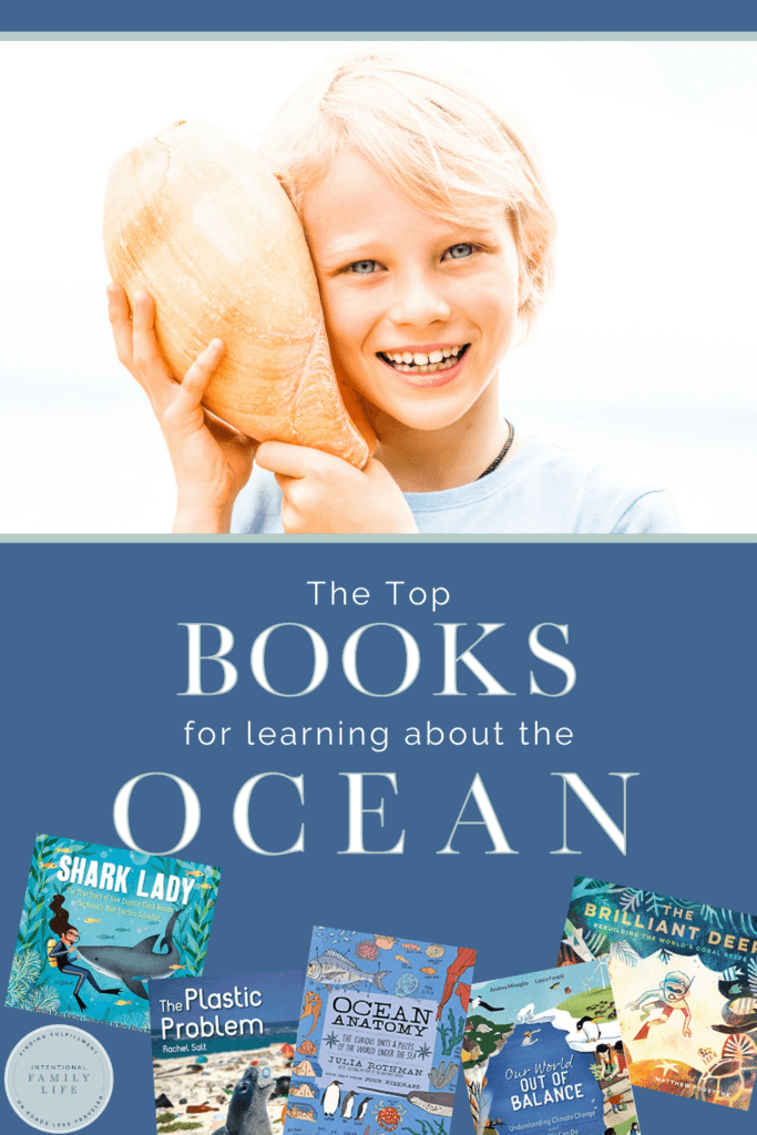 an image of a young boy holding a large shell up to his ear suggesting learning ocean facts for kids