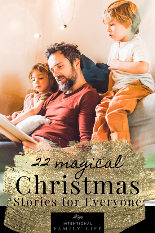image of father with two young children reading a story - lights in the background suggest the holiday season and a Christmas family read aloud